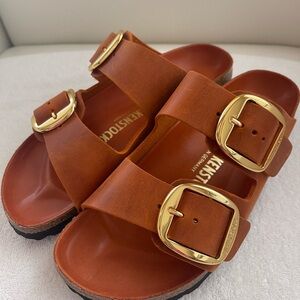 NEW BIRKENSTOCK ARIZONA BIG BUCKLE SLIDE SANDAL
BURNT ORANGE SIZE: 37 US6